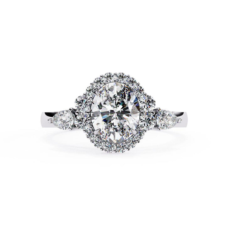 The Anyssa Oval Halo with Three Stone Engagement Ring