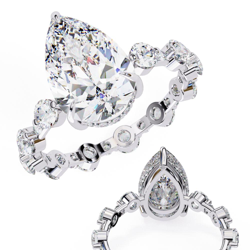 The Desiree Pear Hidden Halo with Shared Prong Engagement Ring