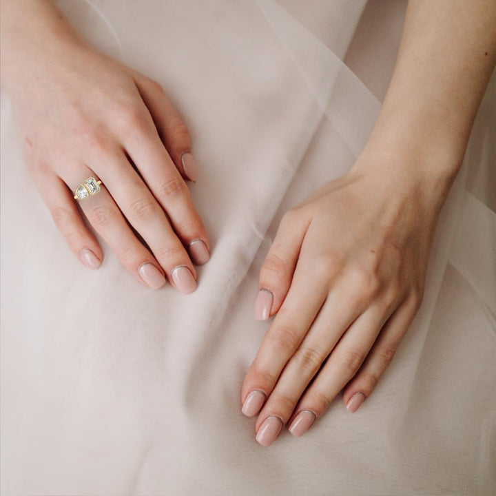 The Delilah Emerald & Pear Bezel Set Toi et Moi Engagement Ring