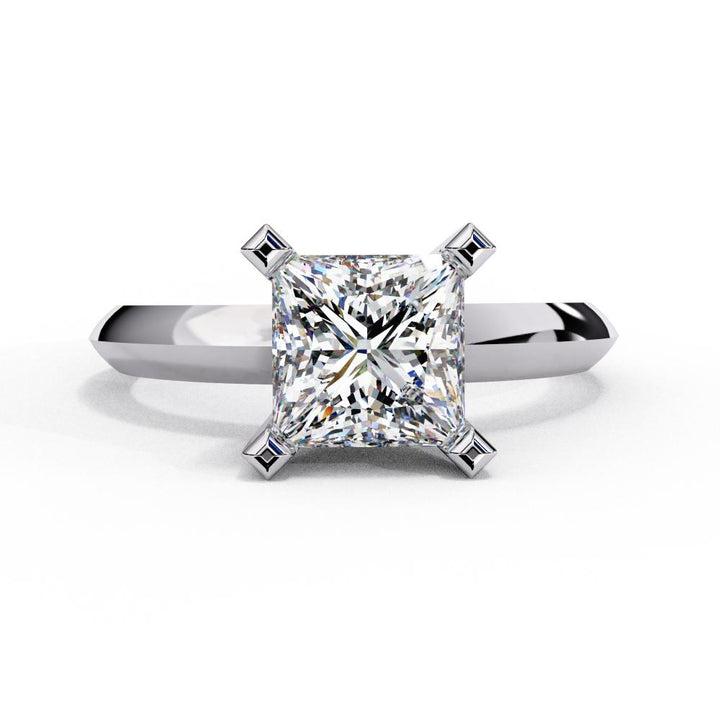 The Reyna Princess Solitaire Peg Head Prong Engagement Ring