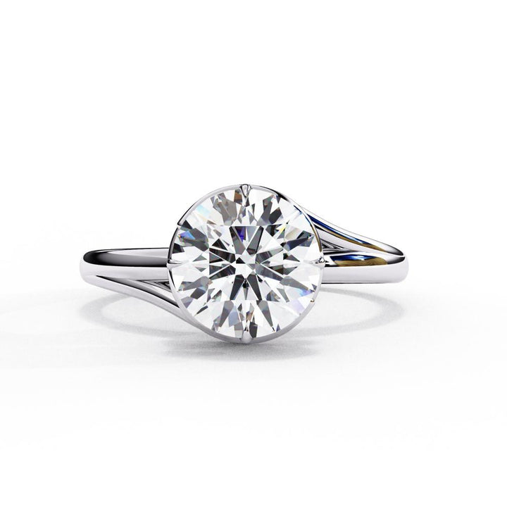 The Carly Round Solitaire Wave Style Engagement Ring