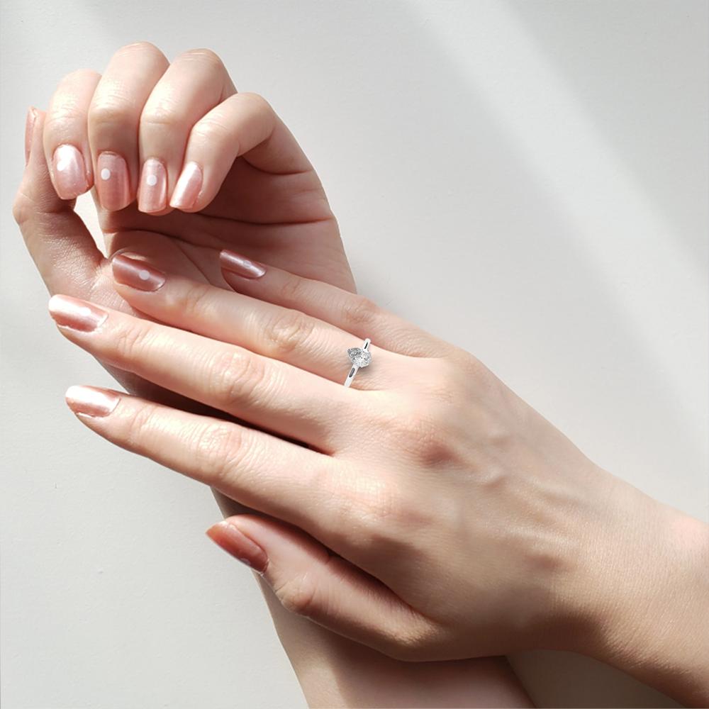 The Mindy Pear Petite Pave Hidden Halo Engagement Ring