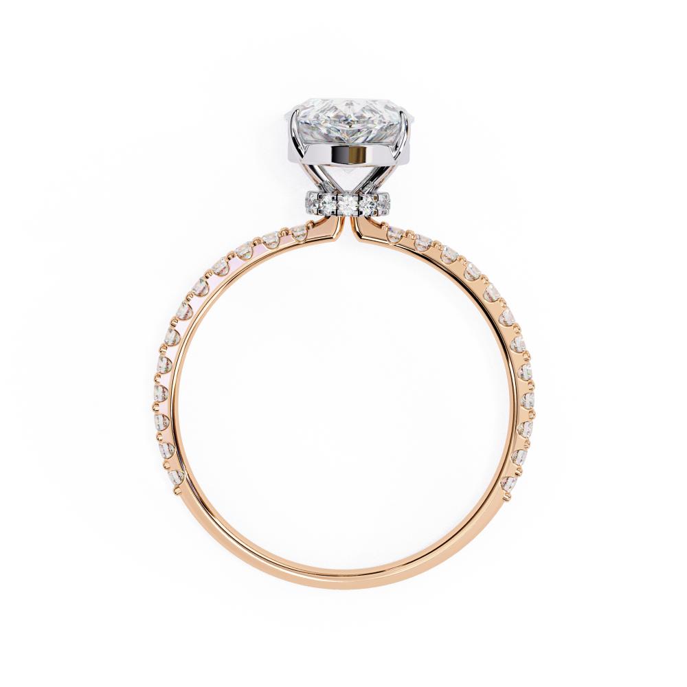 The Erica Pear Mystic Secret Halo Engagement ring