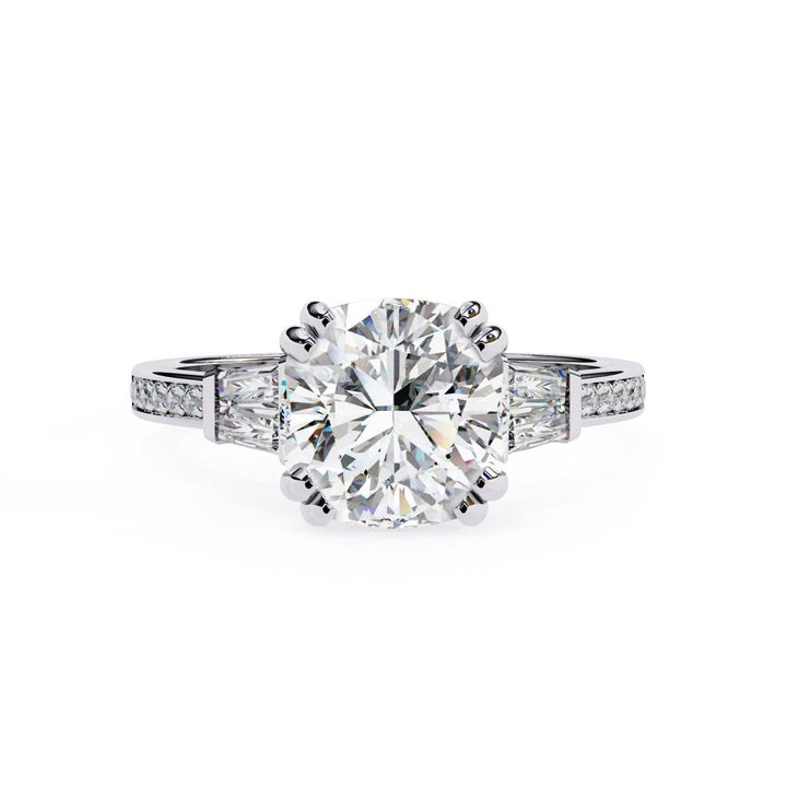 The Justin Cushion Double Claw Prong Three Stone Engagement ring