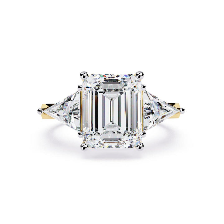 The Stella Emerald With Triangle Three Stone Engagement Ring