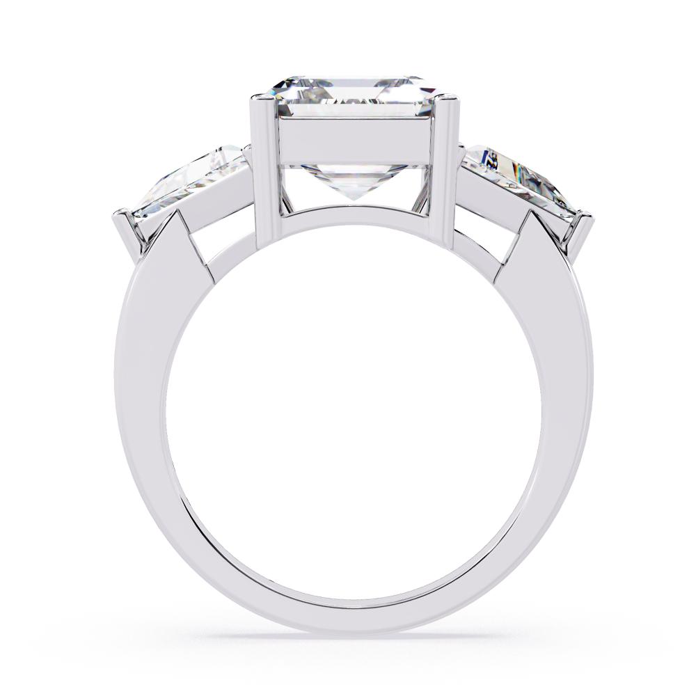 The Stella Emerald With Triangle Three Stone Engagement Ring