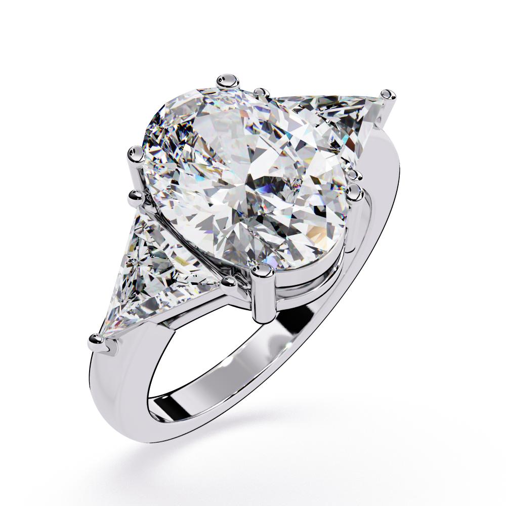 The Stella Oval With Triangle Three Stone Engagement Ring