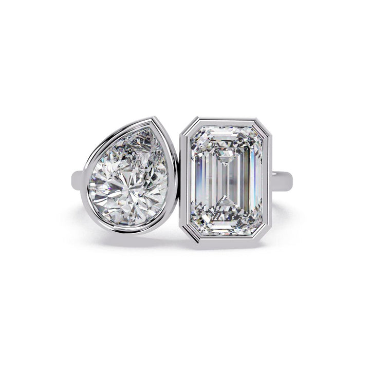The Delilah Emerald & Pear Bezel Set Toi et Moi Engagement Ring