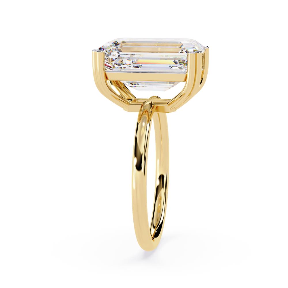 The Nori Emerald Double Claw With Basket Prong Engagement Ring