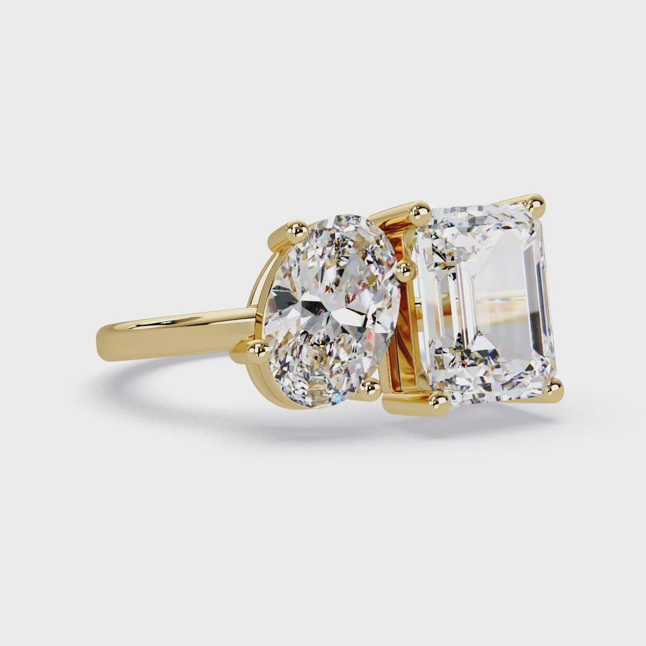 The Scottie Emerald & Oval Toi Et Moi Engagement ring