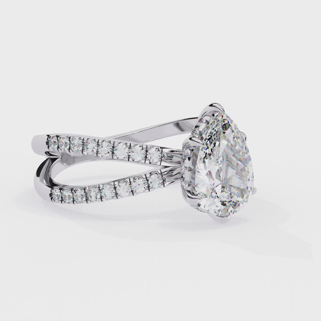The Tory Pear Hidden Halo With Split Shank Engagement Ring