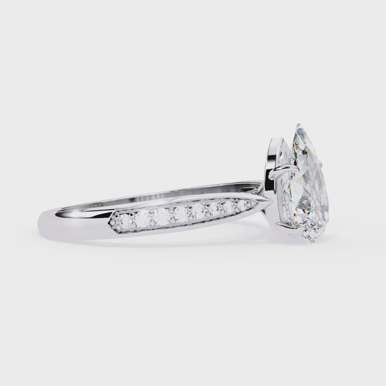 The Nataley Pear Hidden Accent Engagement Ring