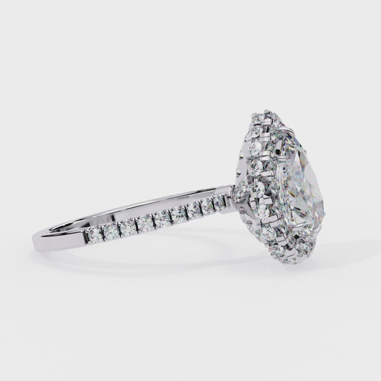 The Jannie Pear Unique Halo Engagement Ring