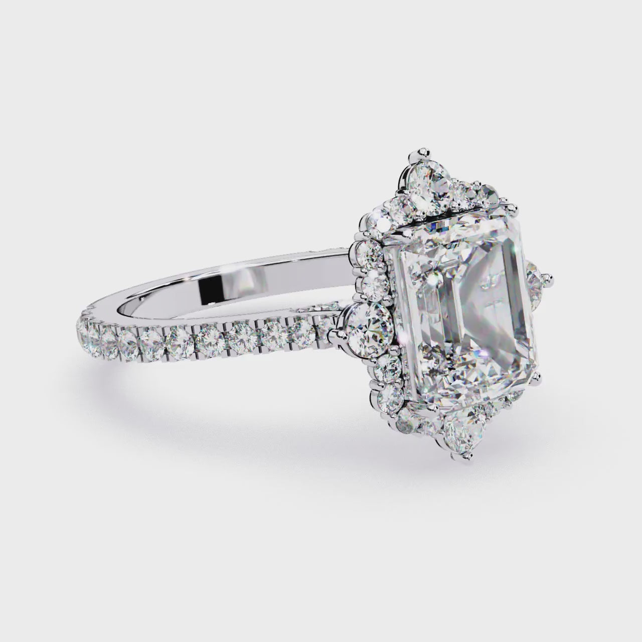 The Livia Emerald Fancy Halo With Pave Band Engagement Ring