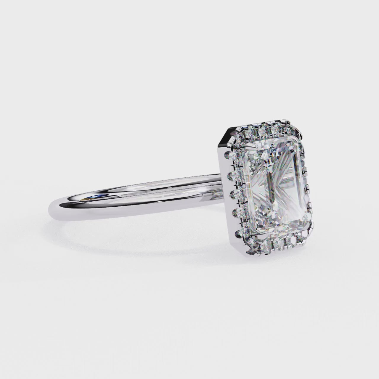The Zachary Emerald Solitaire Halo Engagement ring
