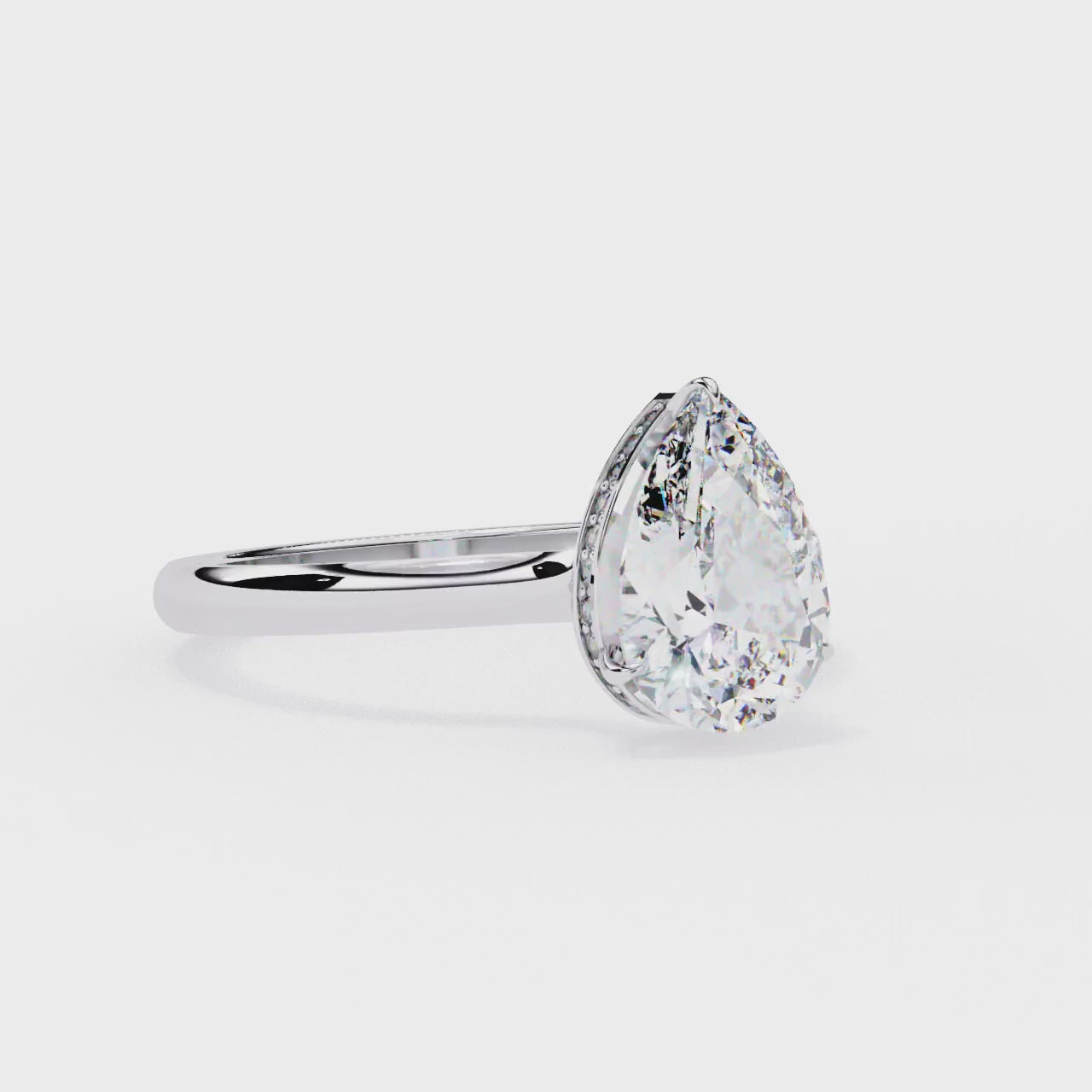 The Mindy Pear Petite Pave Hidden Halo Engagement Ring