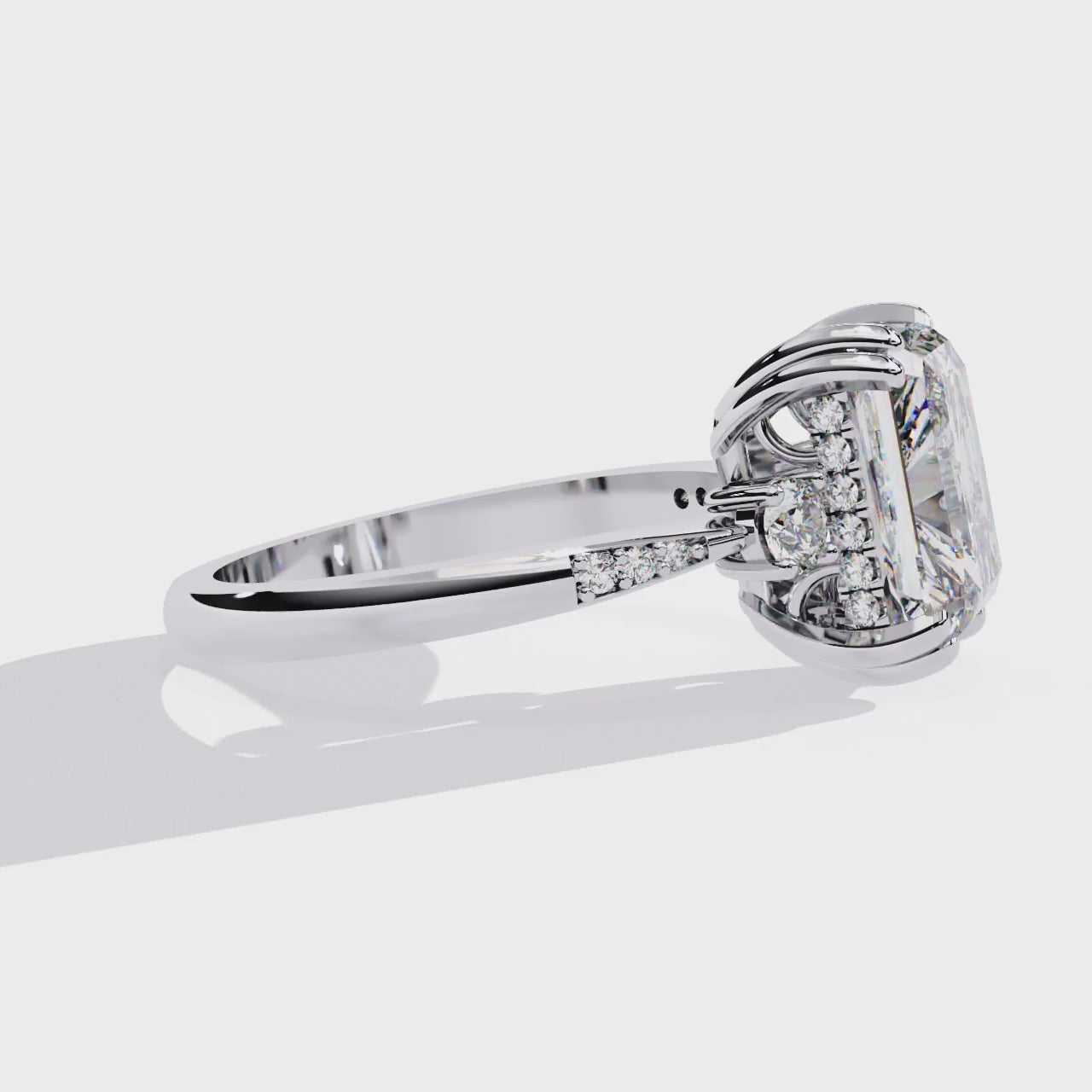 The Mary Radiant Hidden Halo with Three Stone Engagement ring