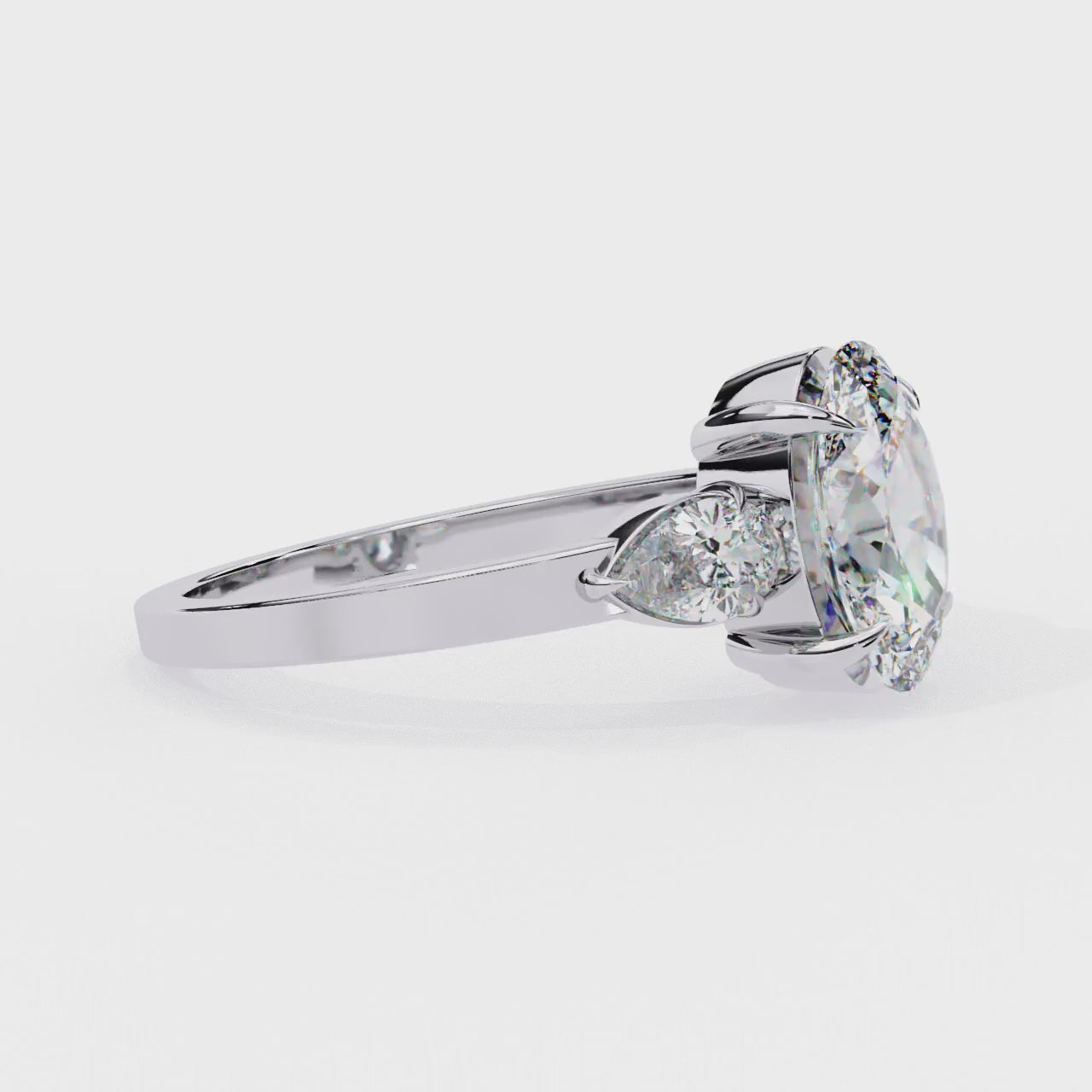 The Amira Oval with Pear Three Stone Engagement ring