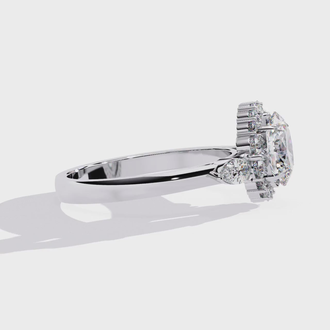 The Anyssa Oval Halo with Three Stone Engagement Ring