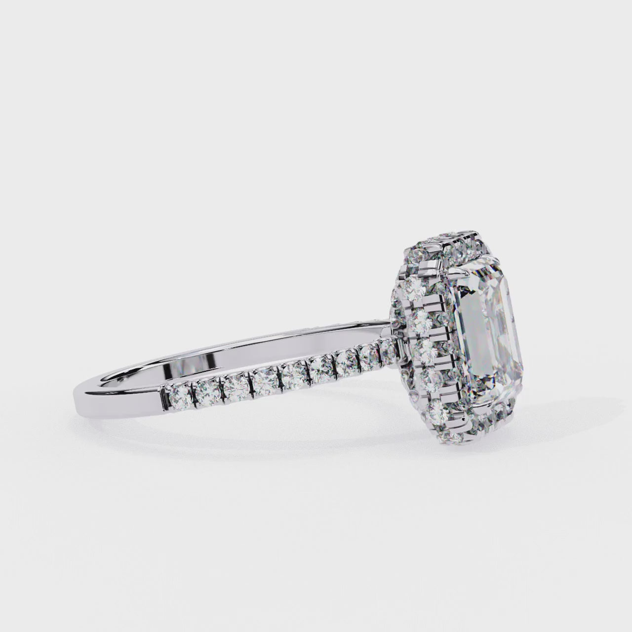 The Jannie  Emerald Unique Halo Engagement Ring