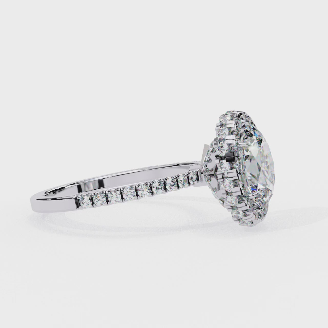 The Jannie Oval Unique Halo Engagement Ring