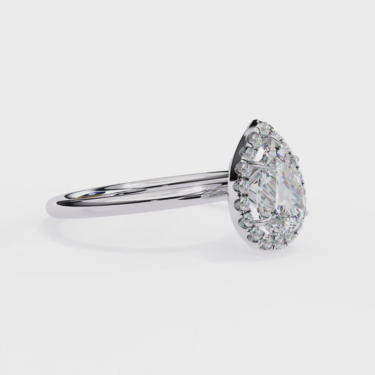 The Zachary Pear Solitaire Halo Engagement ring