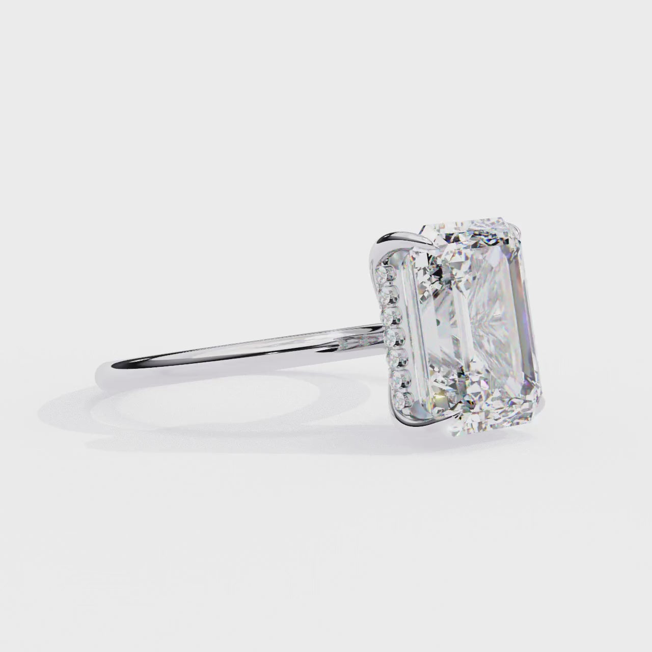 The Anthony Emerald  Solitaire Hidden Halo Engagement ring