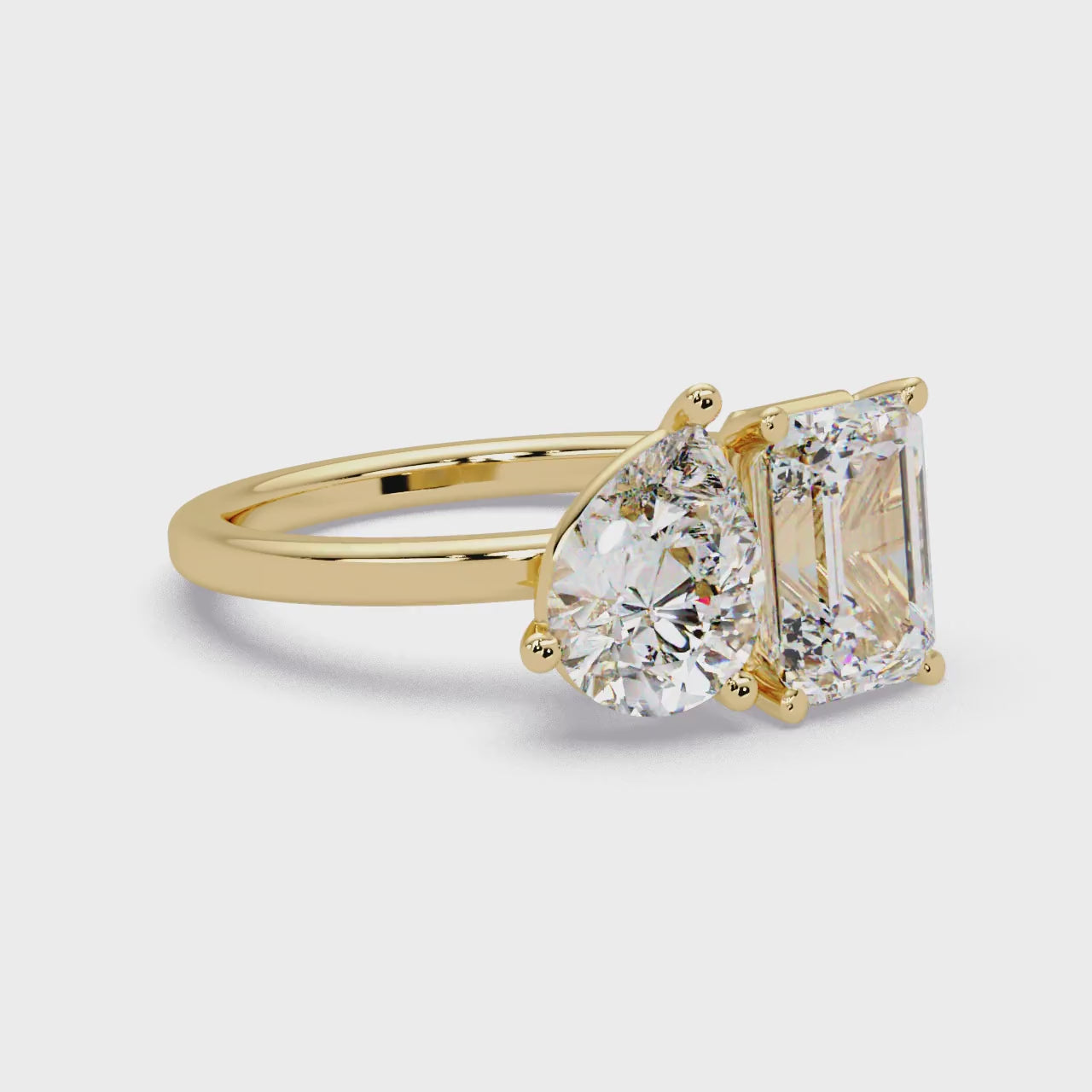 The Sophie Emerald & Pear Toi Et Moi Engagement Ring