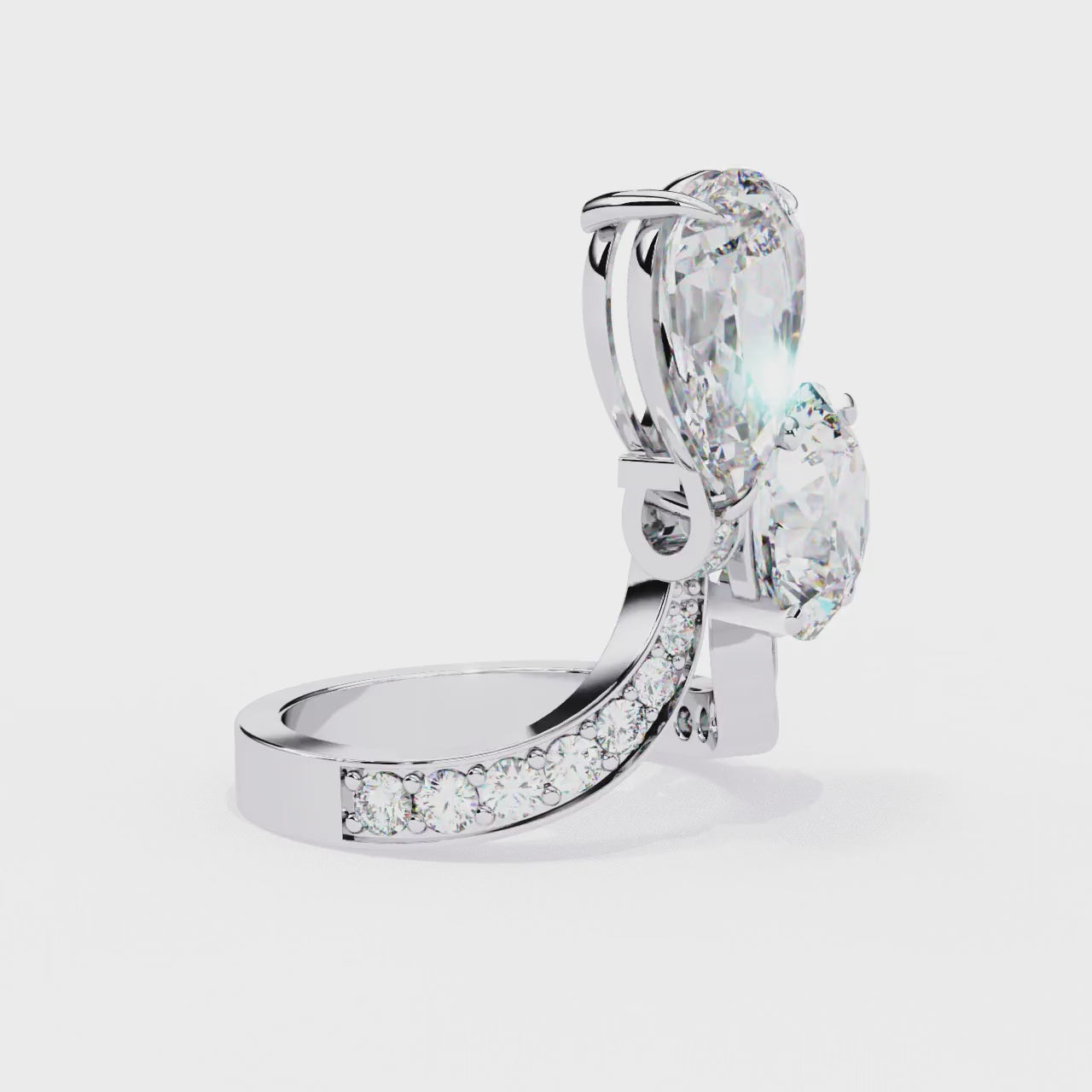 The Bonnie Pear & Round Toi Et Moi Vintage Engagement Ring