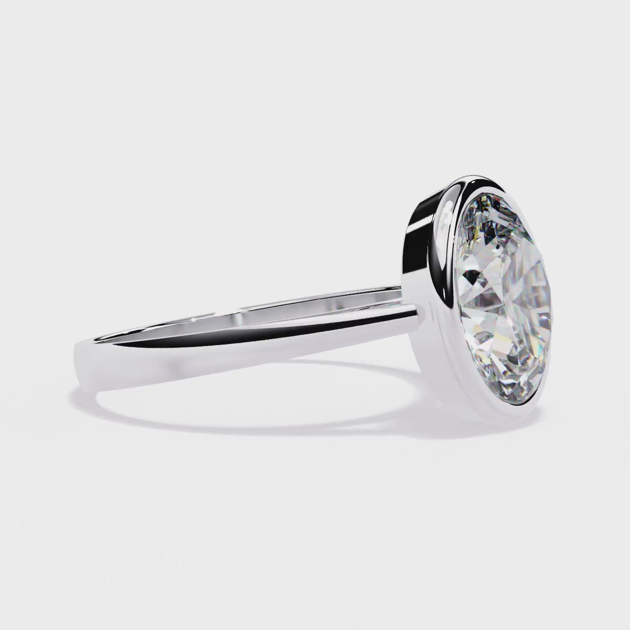 The Emily Oval Solitaire with Calliope Bezel Floating Engagement Ring