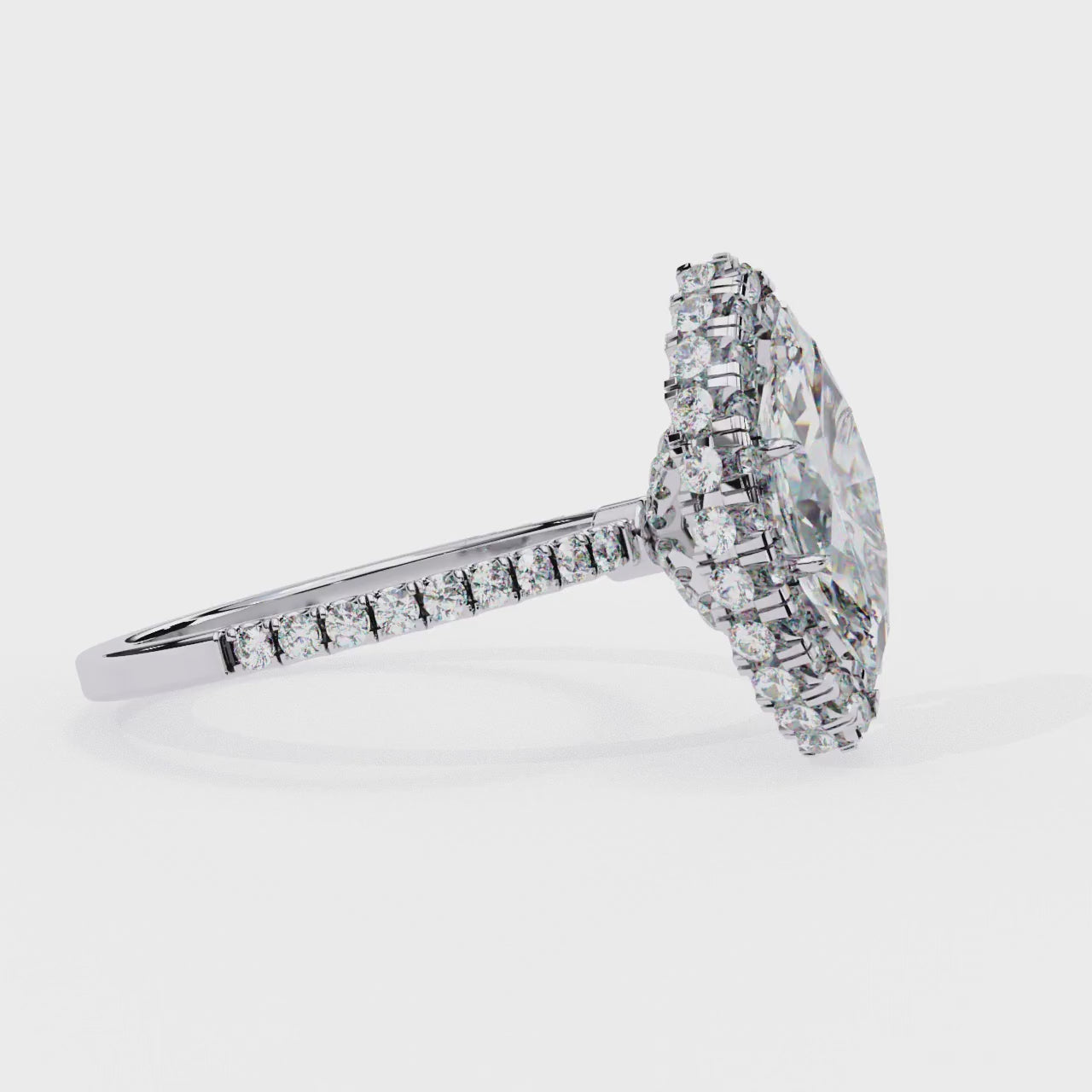 The Jannie Marquise Unique Halo Engagement Ring